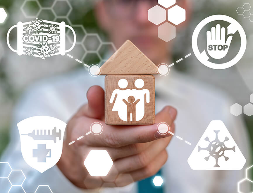 peroson hold house block with family illustration and COVID-19 icons surrounding