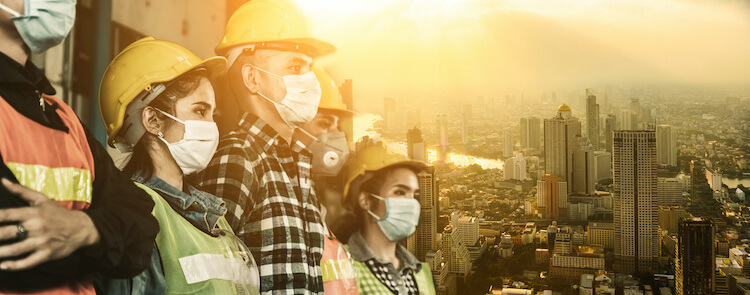 Factory workers with face masks