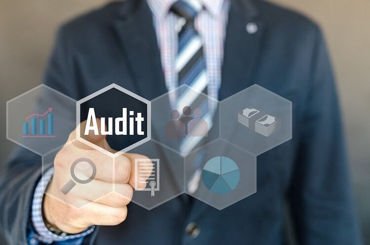 person picking Audit from icons
