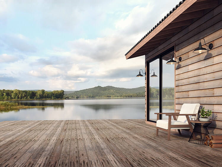 wooden house on a lake